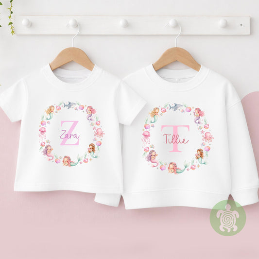 Personalised Mermaid T-shirt | Custom Mermaid Name Sweatshirt | Personalised Baby Vest, Sleepsuit & Bib | Floral Initial Girls Gift