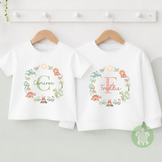 Personalised Dinosaur Name T-shirt | Custom Dino Initial Wreath sweatshirt, Baby Vest, Sleepsuit or Bib | Dinosaur Baby Gift